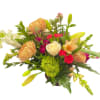 Mixed bouquet with peach, white, and pink flowers in a vase