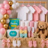 Baby gift basket with balloons, onesies, diapers, and a teddy bear