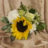 Sunflower bouquet with white blooms and green ribbon