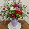 Colorful vase arrangement sure to enchant that special someone in your life!