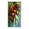 Tall standing floral spray with red, yellow, and orange flowers