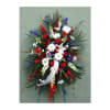 Standing funeral spray with red, white, and blue flowers