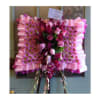 Pink and magenta floral standing spray with ribbon trim