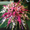 Large pink and white floral spray with lilies and roses