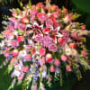 Large pink and lavender floral spray with roses and lilies