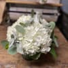White hydrangea bouquet with eucalyptus in a vase