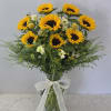 Golden sunflowers steal the show in this vibrant hand-tied flower arrangement, a