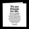White quote card with black text about friendship