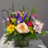This charming arrangement is bright and inviting for any occasion! Send someone