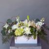 Express your deepest condolences with the serene beauty of the "Comforting Wishes"