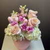 Hop into spring with our Some-Bunny Special arrangement! This playful Easter design