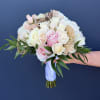 Wedding bouquet of pink and white roses with gold fan accents