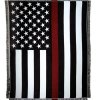 Black-and-white American flag blanket with a red stripe and fringe