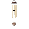 Hanging metal wind chime with gold tubes and a decorative medallion