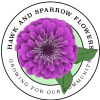 Purple flower logo with circular text and green leaves