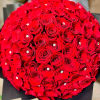 Round bouquet of red roses with small crystal accents