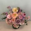 This gorgeous arrangement is small but has all the prettiest of colors