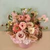 Make someone happy with the stylish arrangement of golden, dusty, blush colors