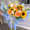 Mix flowers bouquet of sunflowers, gerbera daisy and lisianthus, wrap with light