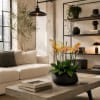 Potted orchid arrangement in a black bowl on a coffee table