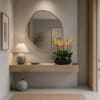 Potted orchids with yellow and pink blooms on a console table
