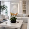 Potted orchid arrangement with yellow and peach blooms on a coffee table