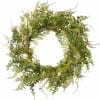 Circular greenery wreath with mixed fern and eucalyptus-like foliage