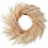 Beige dried grass wreath with a circular opening