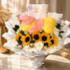 Sunflower bouquet with white daisies and a yellow plush bear