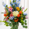 A bright, garden-like bouquet that feels like a celebration in bloom-this large