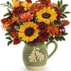 Autumn Acorn Bouquet is bursting with fall flowers like sunflowers, carnations, and