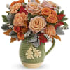 Rosy Autumn Bouquet is presented in a food- safe, glazed stoneware pitcher