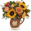 Warm as the autumnal sun, this joyful sunflower bouquet is perfectly presented