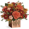 Capture the magic of fall with this seasonal rose bouquet, presented in
