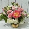 A stunning arrangement for those who love pink! This beauty has peonies