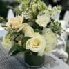 This beautiful whites and green design is anything but simple. It&rsquo;s elegant