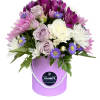 Lavender and white bouquet in a purple hatbox