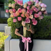 Make a lasting impression with this stunning arrangement of 100 premium long-stem