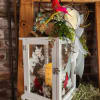 White lantern with red bird decoration and ribbon accents
