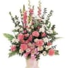 Pink and white floral arrangement in a vase