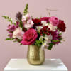 A delicious blend of hot pink, light pink, and blush blooms arranged