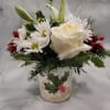 This arrangement is arranged in a metal holly bucket planter that is
