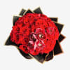 Red rose bouquet with pink orchids wrapped in black paper