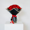 A dome of premium red roses arranged in a compact, luxurious cluster