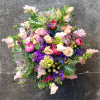 Luxe + Feminine

Soft pastel roses and billowy ranunculus mingle with delicate sweet