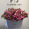 Large bouquet of pink spray roses in a white gift box