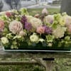 Plated glass rectangles are the perfect luxury vessel for flowers creating a