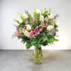 This stunning arrangement of a dozen White Rose is accented with Star