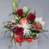 Flowers and something sweet! This Mother's Day special arrangement features fresh roses