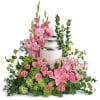 The Sacred Solace cremation tribute is a memorial arrangement designed to honor